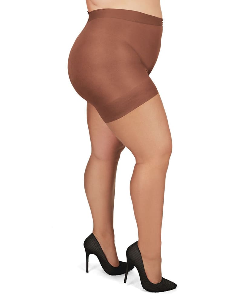 Side of a model wearing a size 5X-6X Plus Size Curvy Ultra Sheer Control Top Pantyhose in French Coffee by Memoi. | dia_product_style_image_id:299554